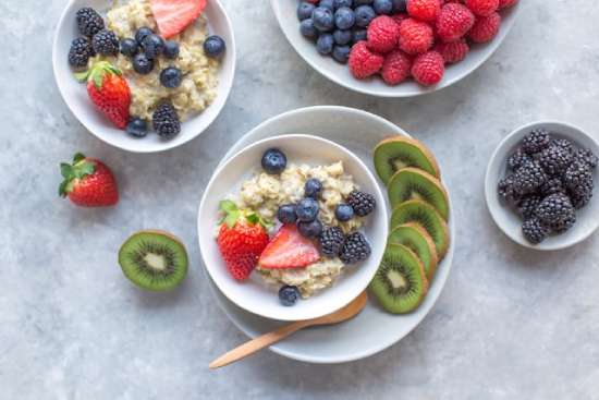 Bowls of oatmeal with fruit, a breakfast Adventists might have