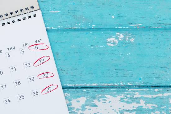 A calendar with Saturdays circled in red, highlighting the point that Adventists worship on Saturdays.