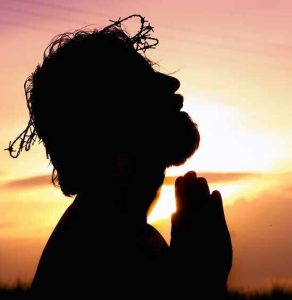 Jesus Christ, praying to His Father in Gethsemane, bearing the sins of the world