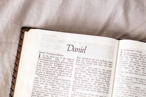 The Bible open to Daniel, the book that Adventists studied to understand more about the Second Coming