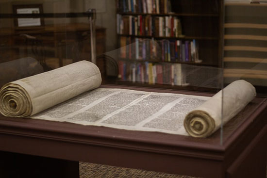 Scroll in a museum as we study how the Old Testament writings were written and copied on scrolls in ancient Hebrew.