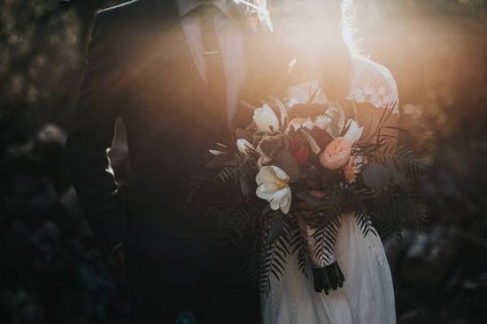 Newlyweds embracing each other and reflecting Jesus' relationship with His people