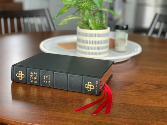 A King James Version Bible sitting on a table