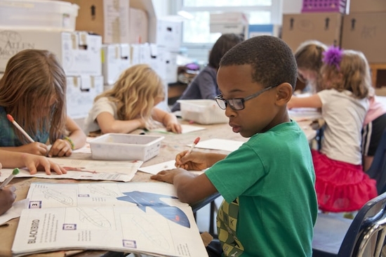 Children working on crafts at a Christian kindergarten