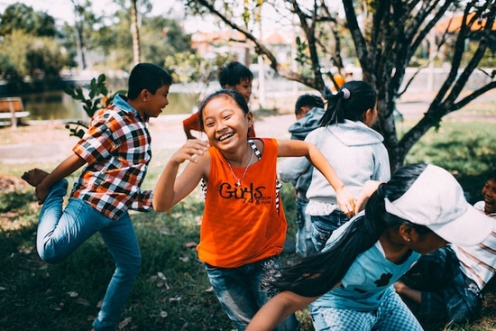 Children at a Christian middle school playing games outside