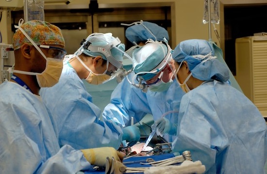 Doctors and nurses in a heart surgery during a study on intercessory prayer
