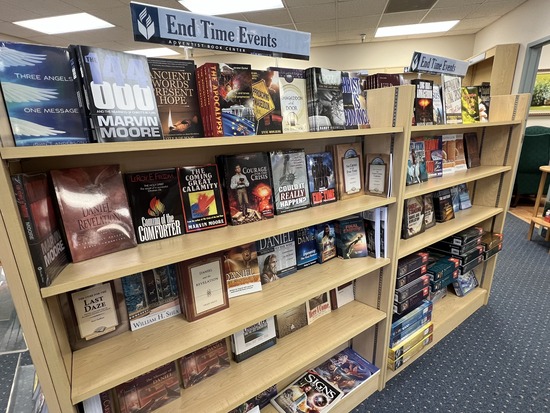 A shelf at an Adventist Book Center, containing books about last-day events