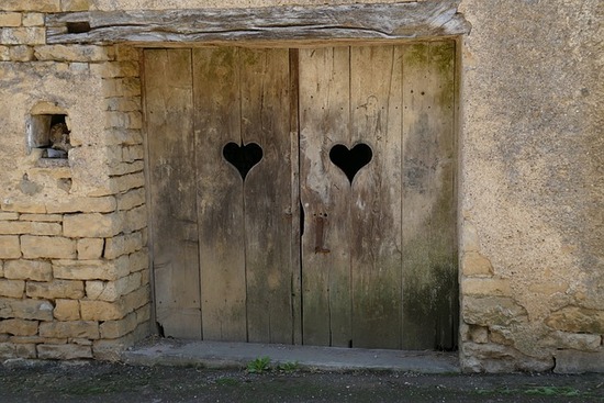 A wooden door illustrating that Jesus is the door to eternal life