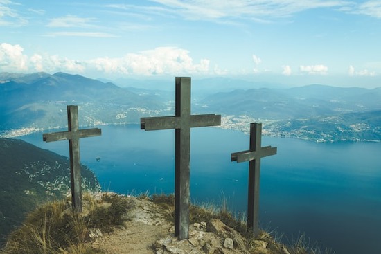 Three crosses on a hill, representing Jesus' sacrifice, the only thing that can save us