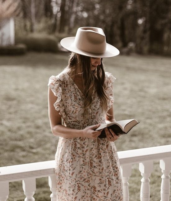 A modest woman reading a Bible