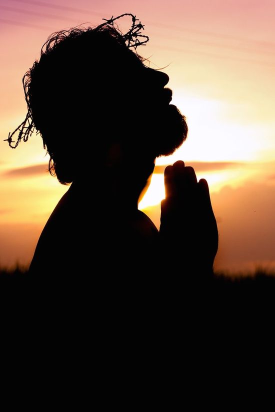 Silhouette of Jesus praying to His Father in Gethsemane