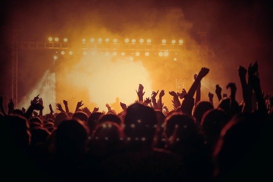 Hands lifted at a music concert