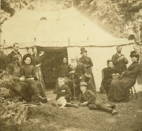 Ellen White and other Seventh-day Adventists sitting outside a big white tent at a camp meeting in Norway