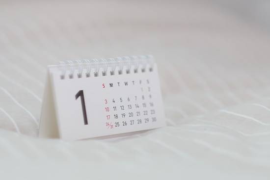 A calendar with Sundays marked in red