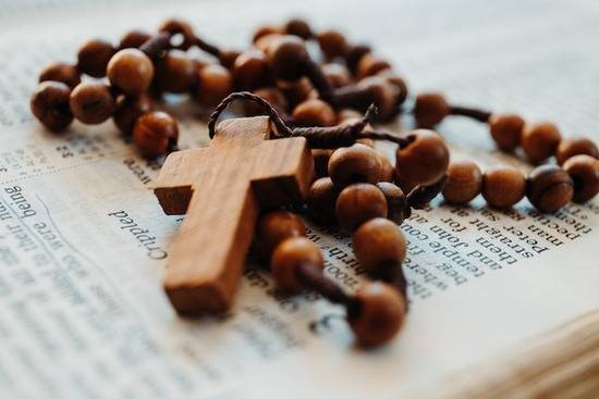 A rosary and a cross