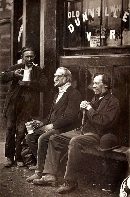 Old men smoking and drinking