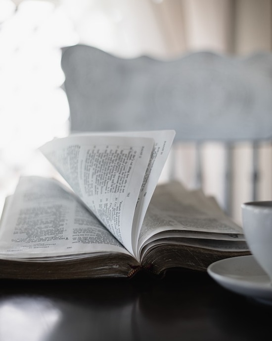 An open Bible on a table representing spiritual health