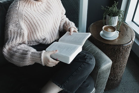 A woman reading the Bible