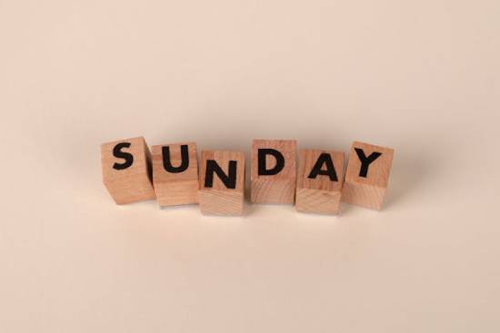 Wooden blocks with letters that spell Sunday Wooden blocks spelling, "Sunday."