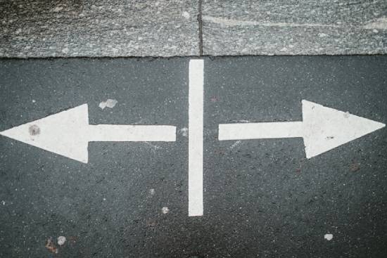 Two white arrows on the pavement pointing in opposite directions Two white arrows are painted on the pavement, pointing in opposite directions. And they represent the choice we all make (whether we know it or not) about who's the real hypocrite—Jesus or Satan.